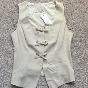 A New Day Cream Sleeveless Blouse with Bow Details